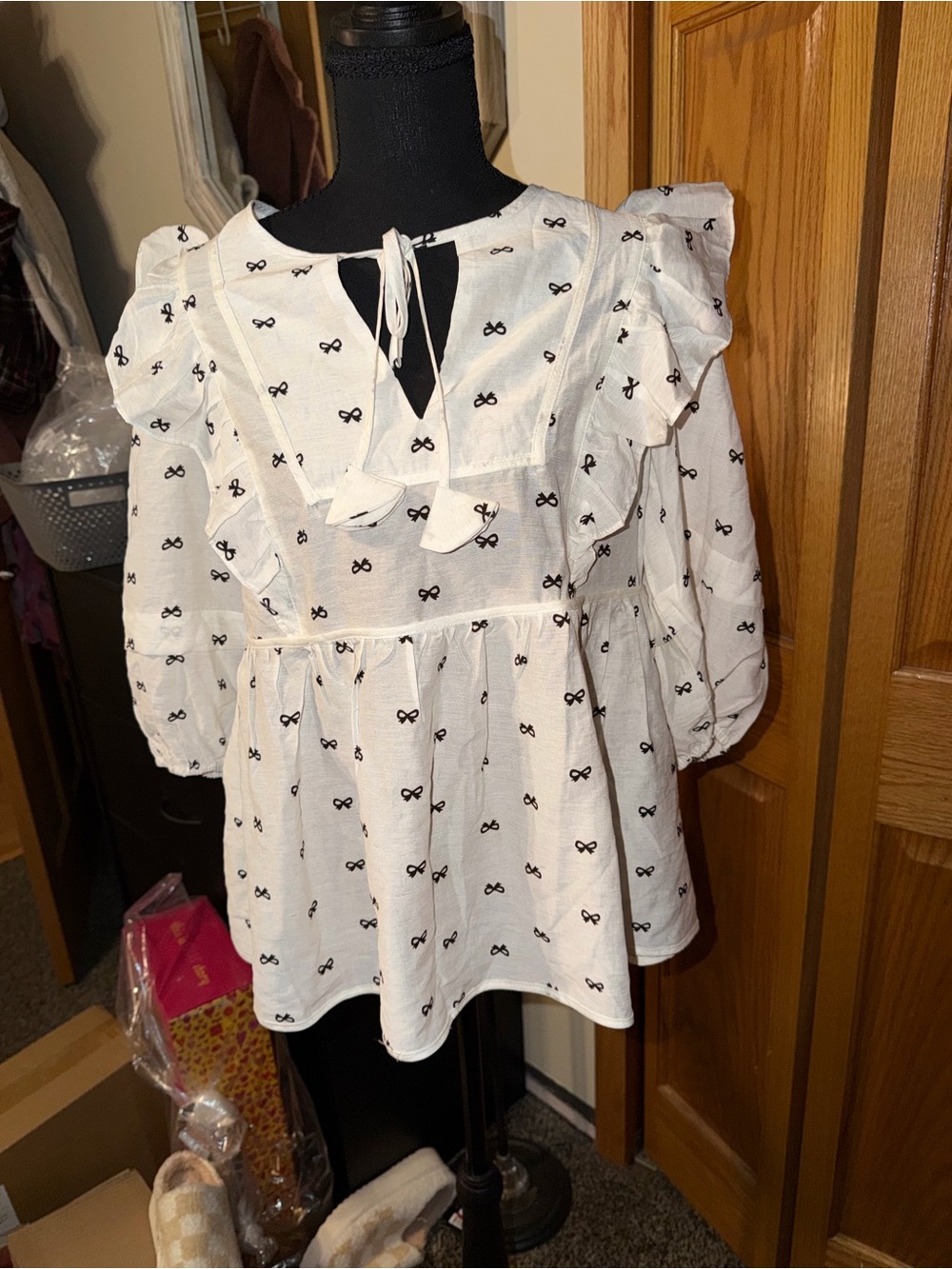 Umgee White Ruffle Peplum Blouse with Black Bow Print